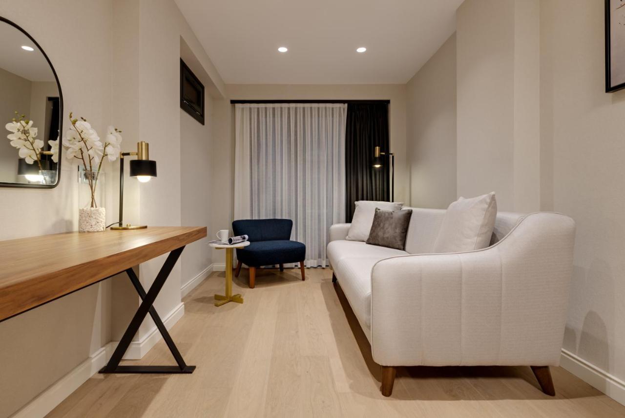 Gleam Collection Hotel Istambul Exterior foto A living room in a micro apartment